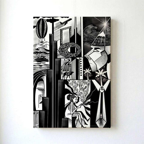 Black and white abstract art piece on a white wall