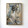 A framed abstract art print depicting the back view of a woman with her hair in a bun, wearing a draped garment, hanging on a white wall.